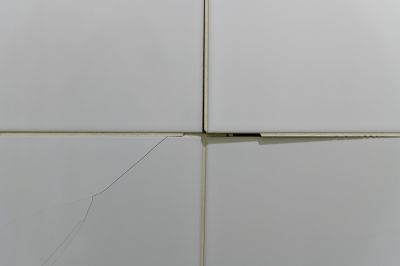 Professional tile repair in progress
